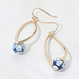 Gold Dipped Floral Ceramic Ball Accent Abstract Teardrop Dangle Earrings