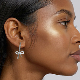 White Gold Dipped CZ Stone Paved Bow Dangle Huggie Hoop Earrings