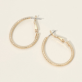 Gold Dipped Textured Oval Hoop Earrings